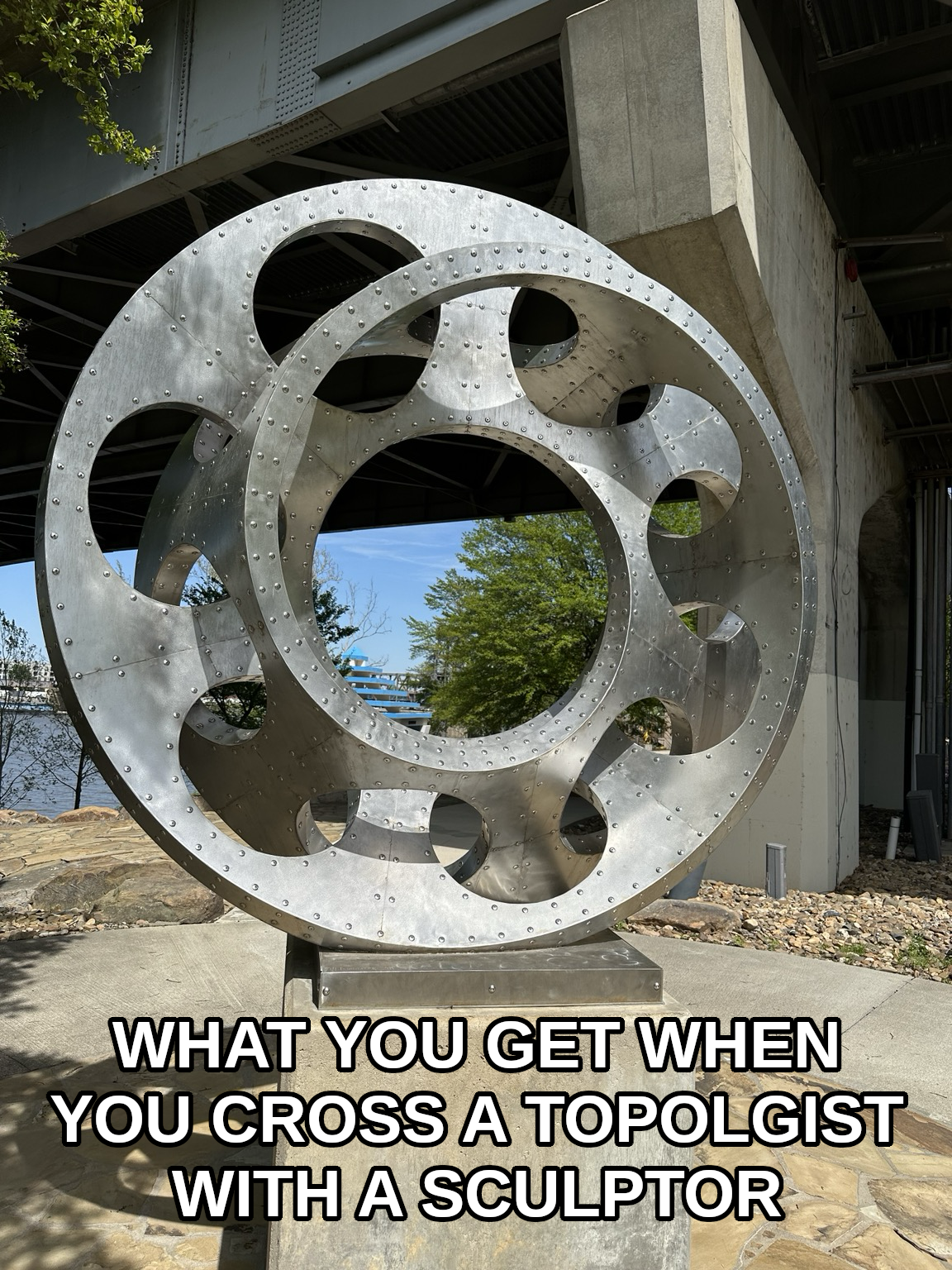 How Many Holes? A Topologist's Dream Sculpture